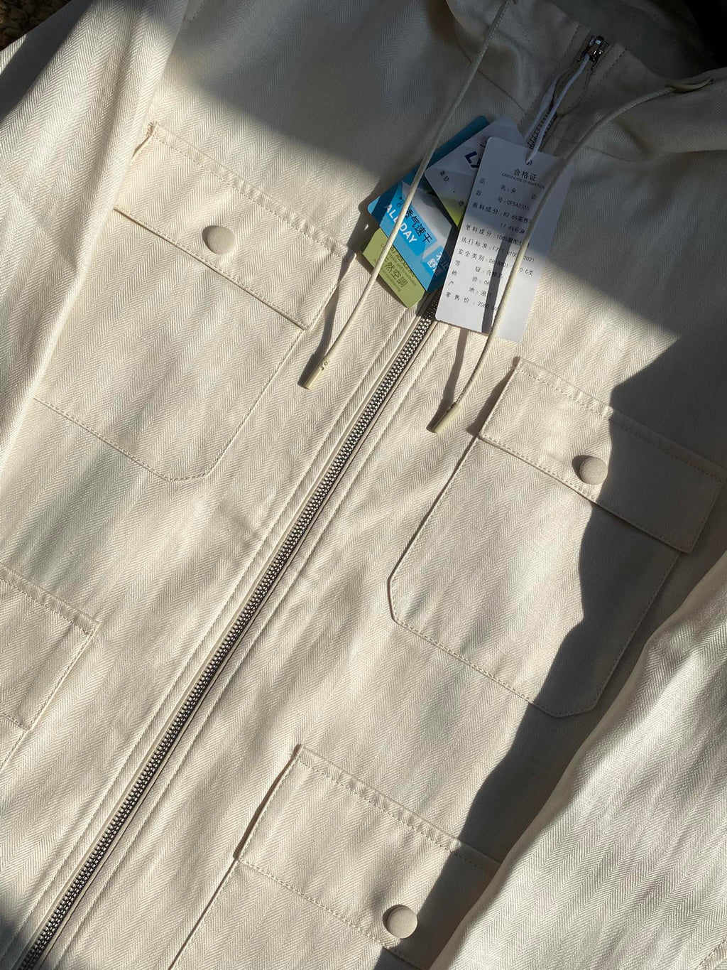 Berluti Cremefarbene Kapuzenjacke Leichter Utility-Style & Zeitloser Minimalismus