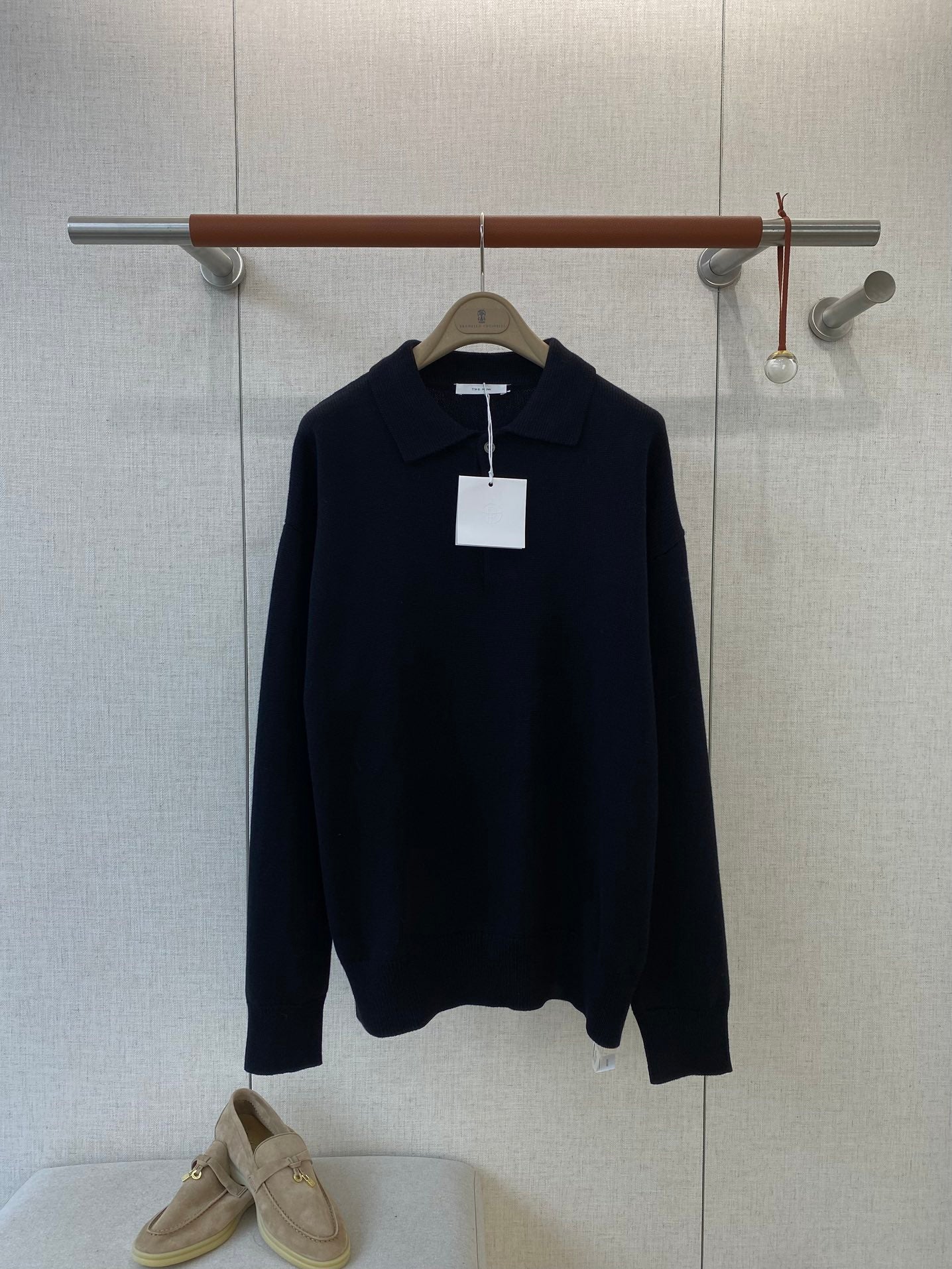 The Row Dunkelblaues Strick-Poloshirt Minimalistische Eleganz & Weicher Komfort