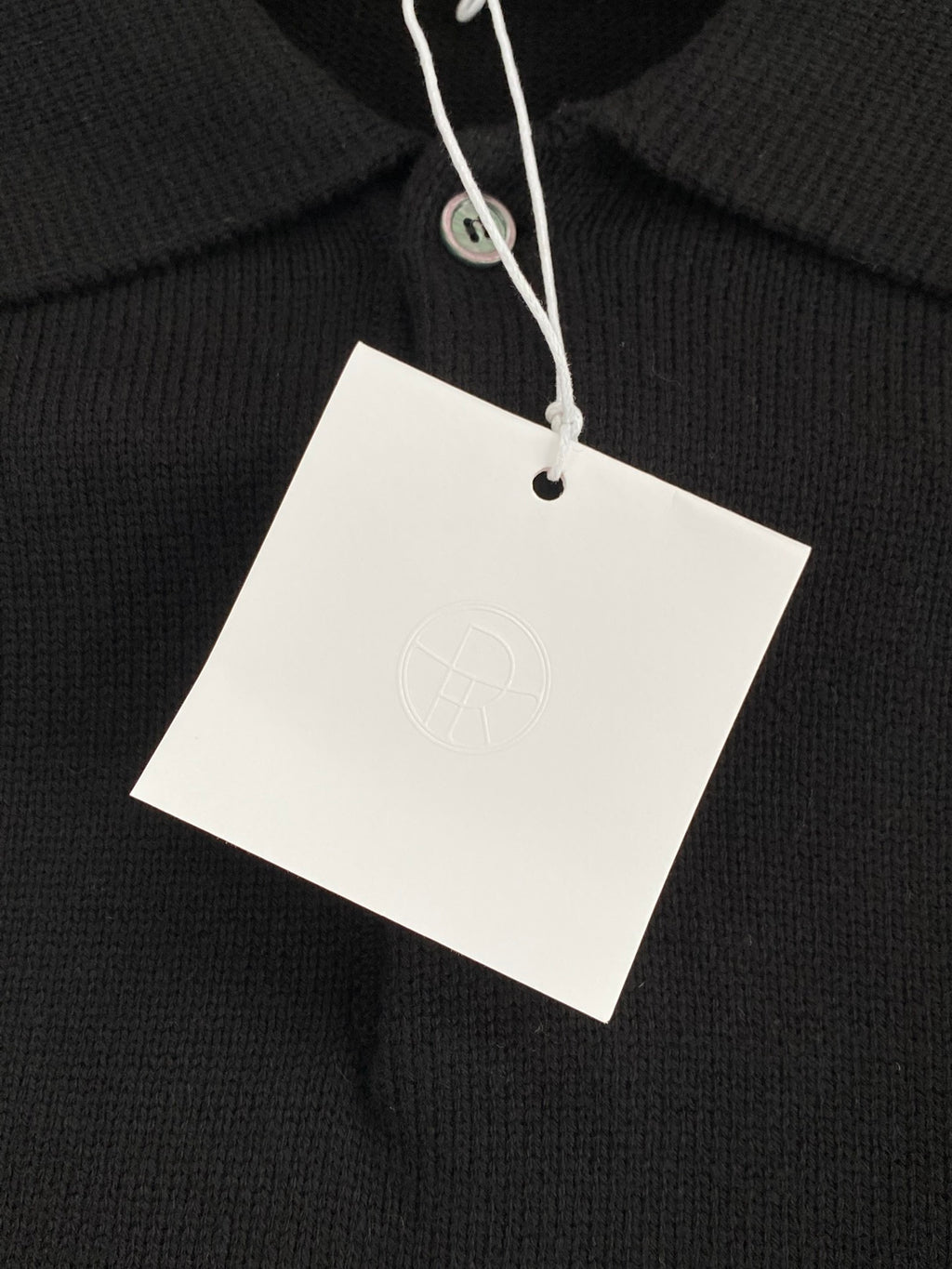 The Row Dunkelblaues Strick-Poloshirt Minimalistische Eleganz & Weicher Komfort