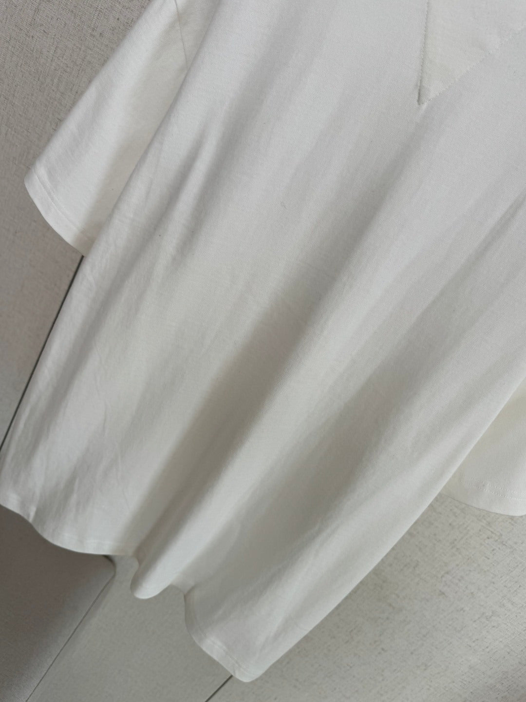 Dior – Weisses T-Shirt mit Herz-Detail in der Brusttasche