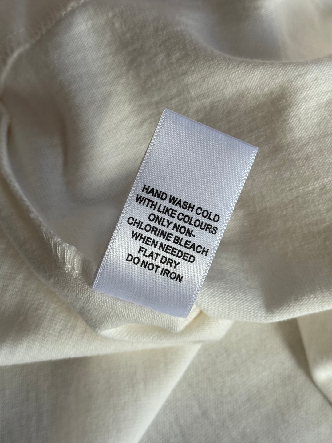 Dior – Weisses T-Shirt mit Herz-Detail in der Brusttasche