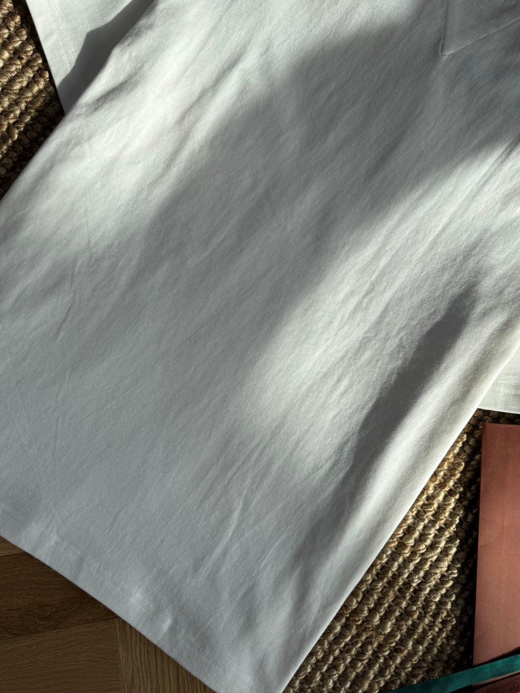 Dior – Weisses T-Shirt mit Herz-Detail in der Brusttasche