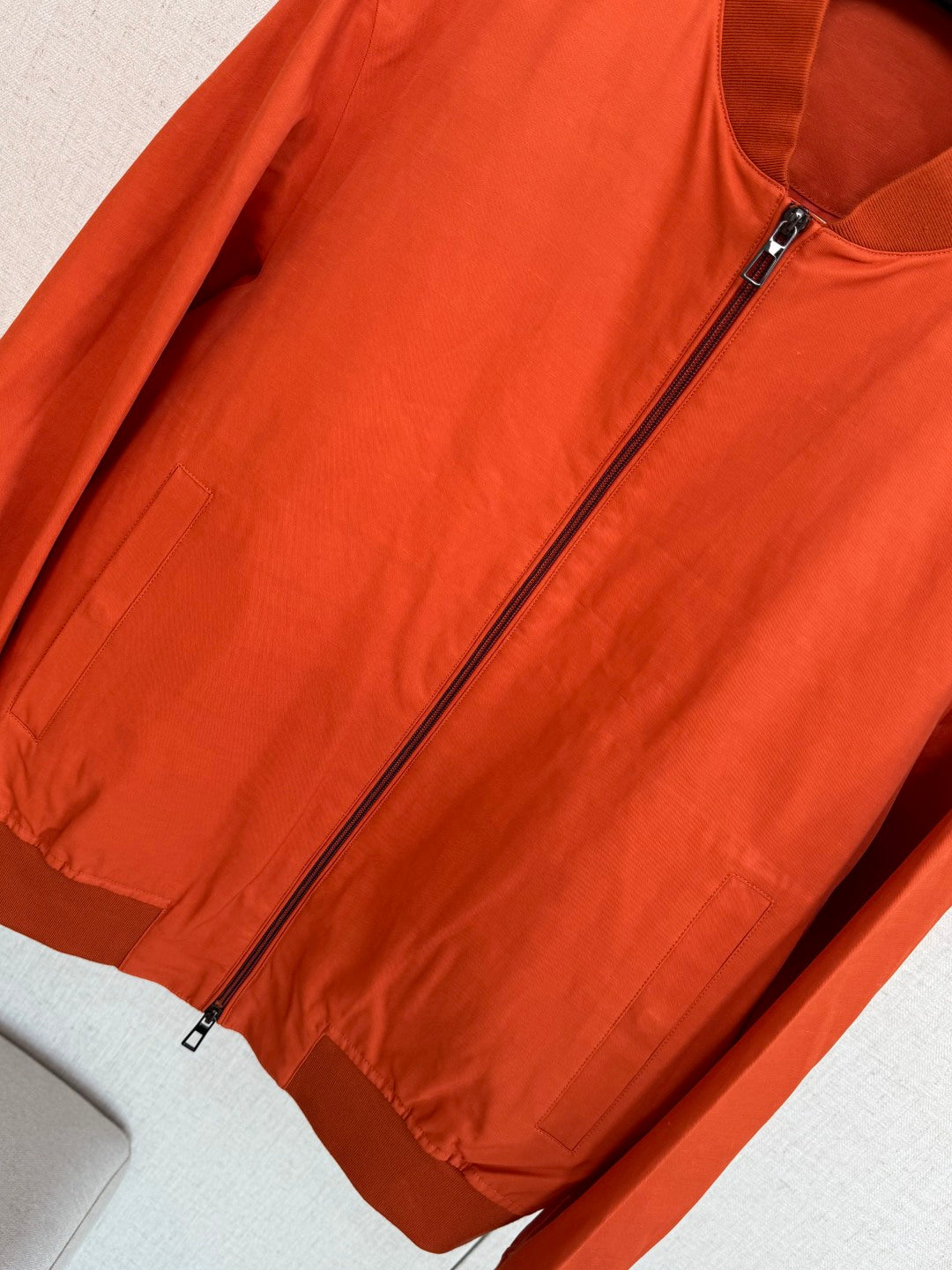 Loro Piana Orangefarbene Herren Jacke mit Reissverschluss und Fronttaschen aus leichtem Material
