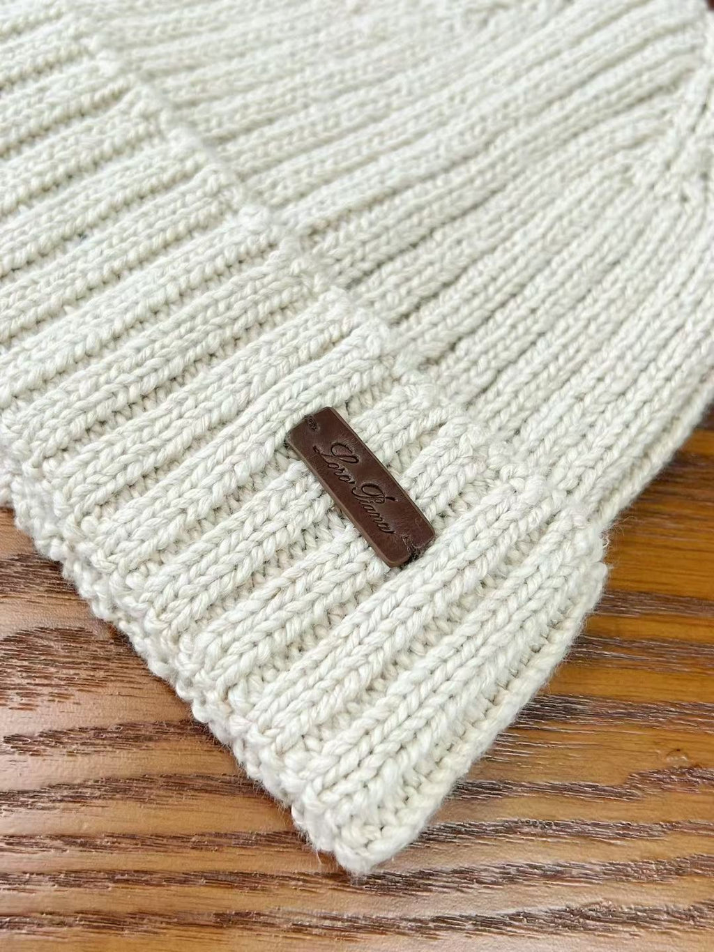Loro Piana – Beiges Beanie aus Baumwolle mit Lederetikett