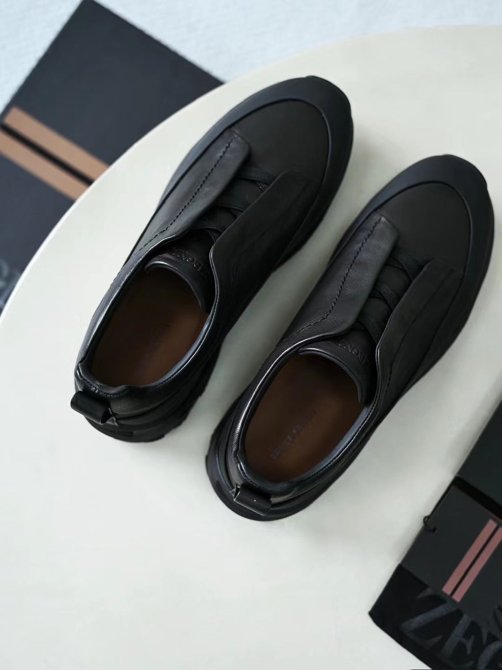 ZEGNA – Schwarze Slip-on-Sneaker aus Leder
