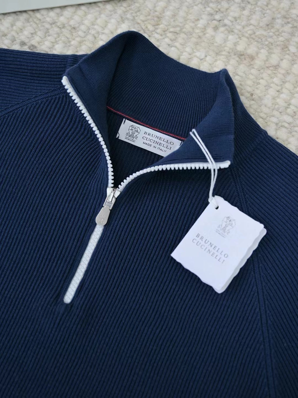 Brunello Cucinelli – Quarter-Zip-Pullover aus gerippter Wolle in Marineblau Herren