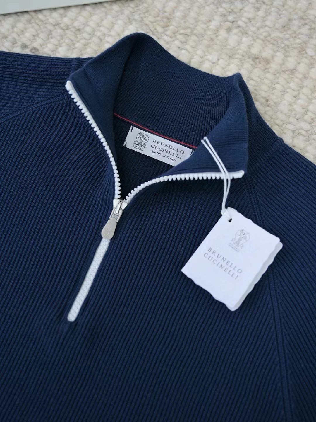 Brunello Cucinelli – Quarter-Zip-Pullover aus gerippter Wolle in Marineblau Herren