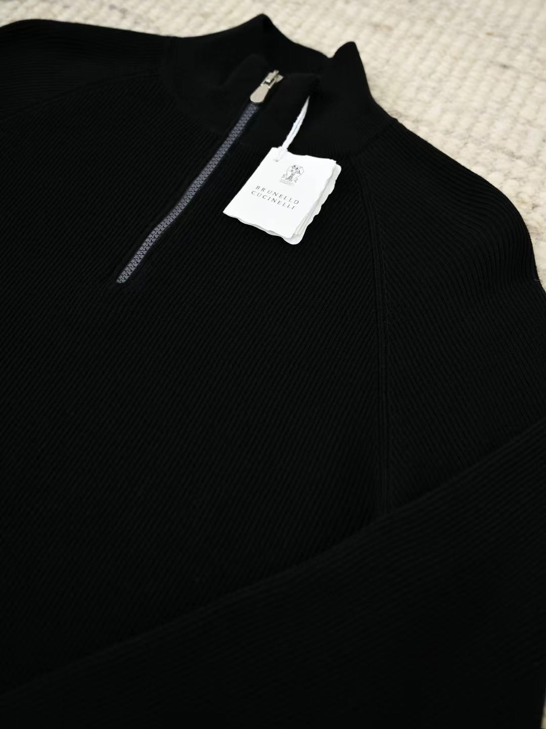 Brunello Cucinelli – Gerippter Half-Zip-Pullover in Schwarz Herren