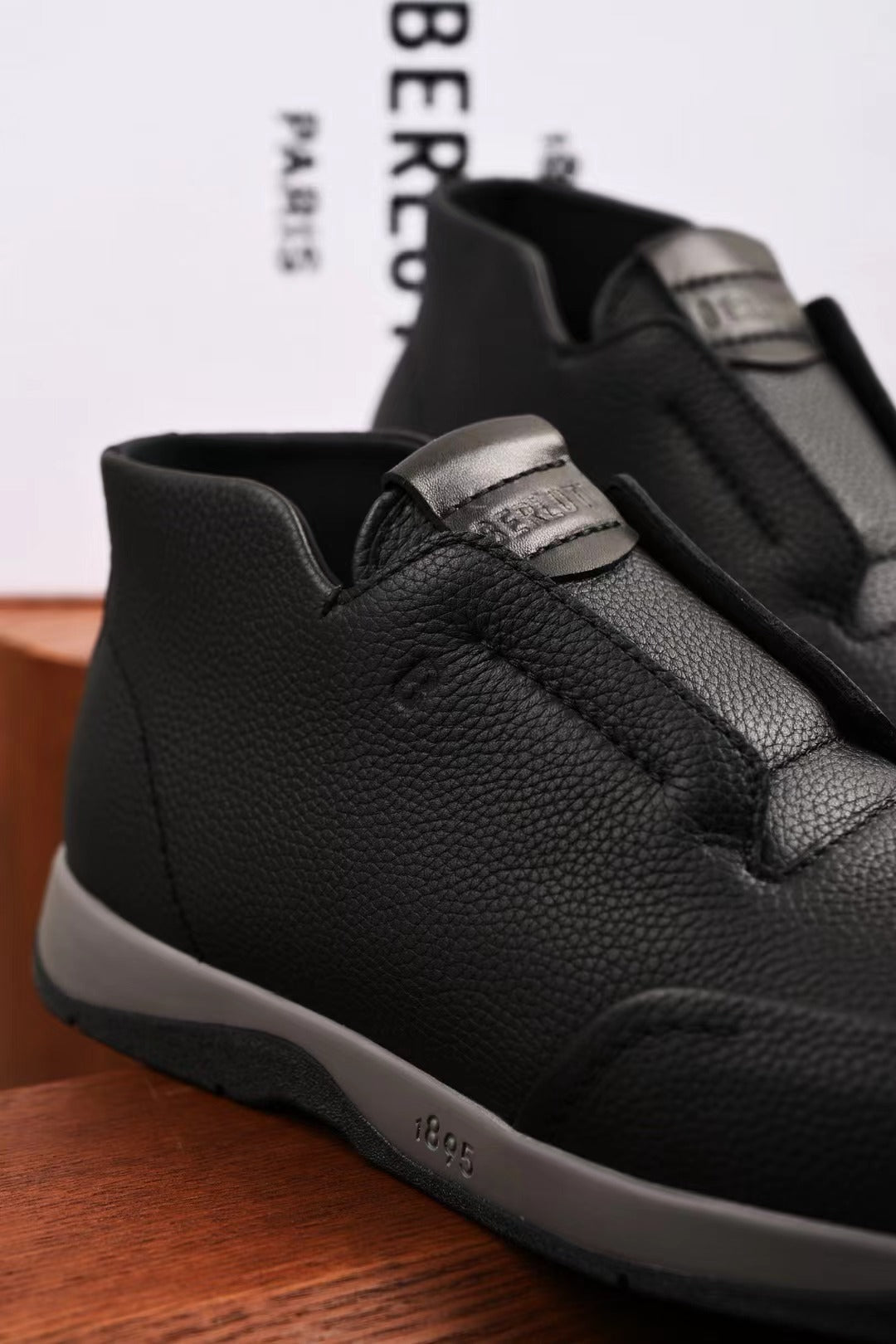 Berluti – Exklusive Winter Slipper aus schwarzem Leder mit Lammfellfutter