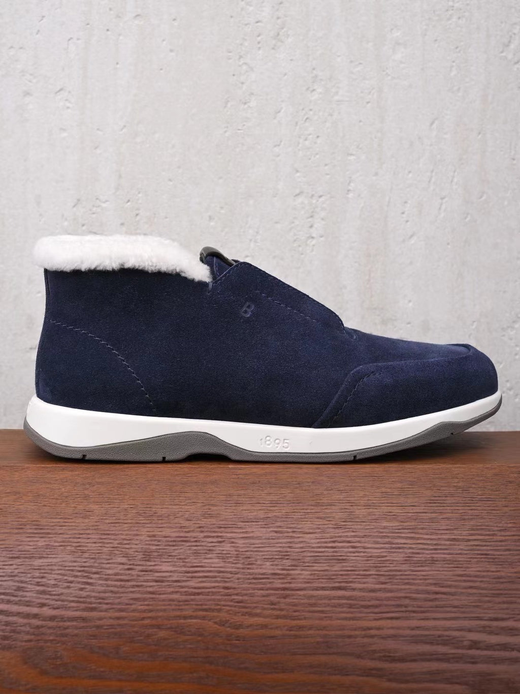 Berluti – Exklusive Winter Slipper aus navyblauem Veloursleder mit Lammfellfutter
