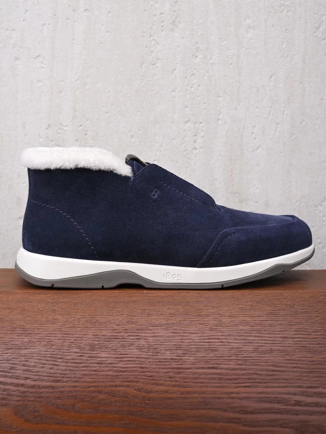 Berluti – Exklusive Winter Slipper aus navyblauem Veloursleder mit Lammfellfutter