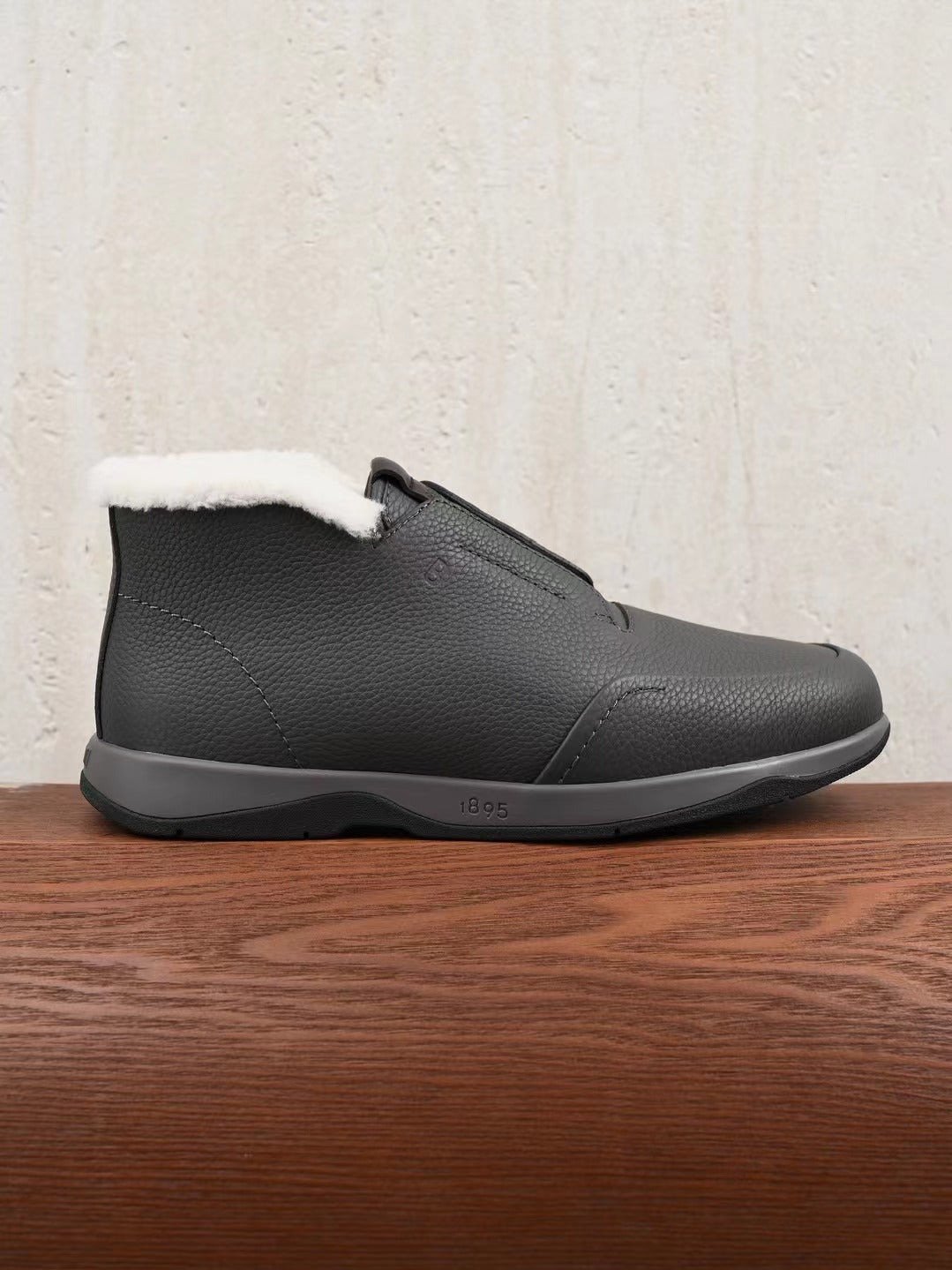 Berluti – Exklusive Winter Slipper in Schwarz aus Leder mit warmem Lammfellfutter
