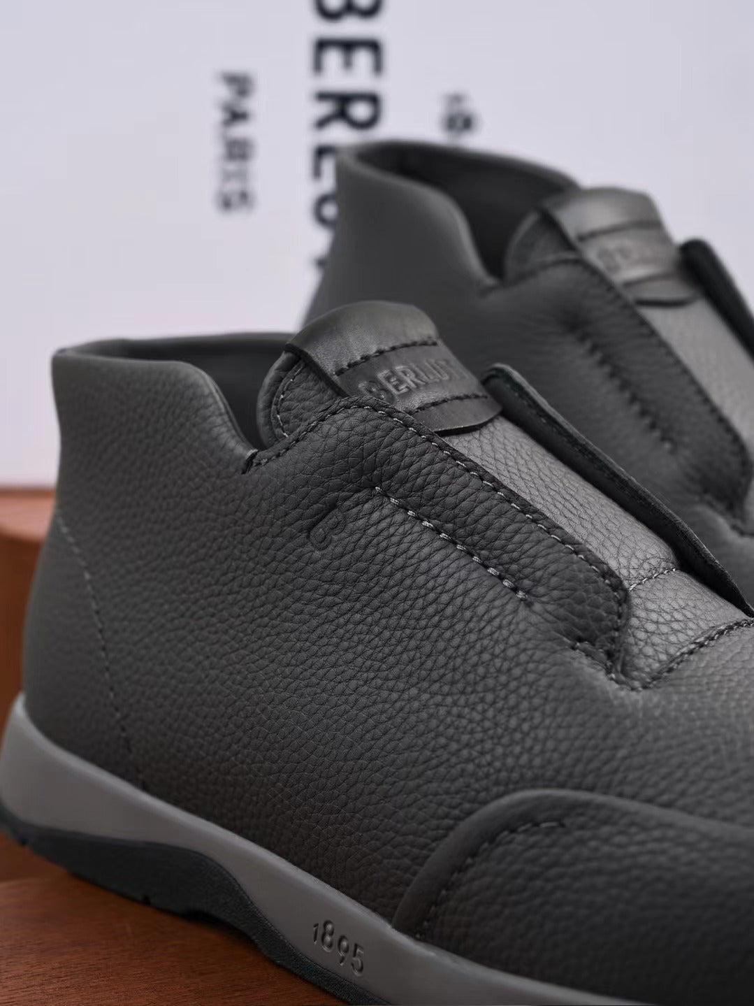 Berluti – Exklusive Winter Slipper in Schwarz aus Leder mit warmem Lammfellfutter