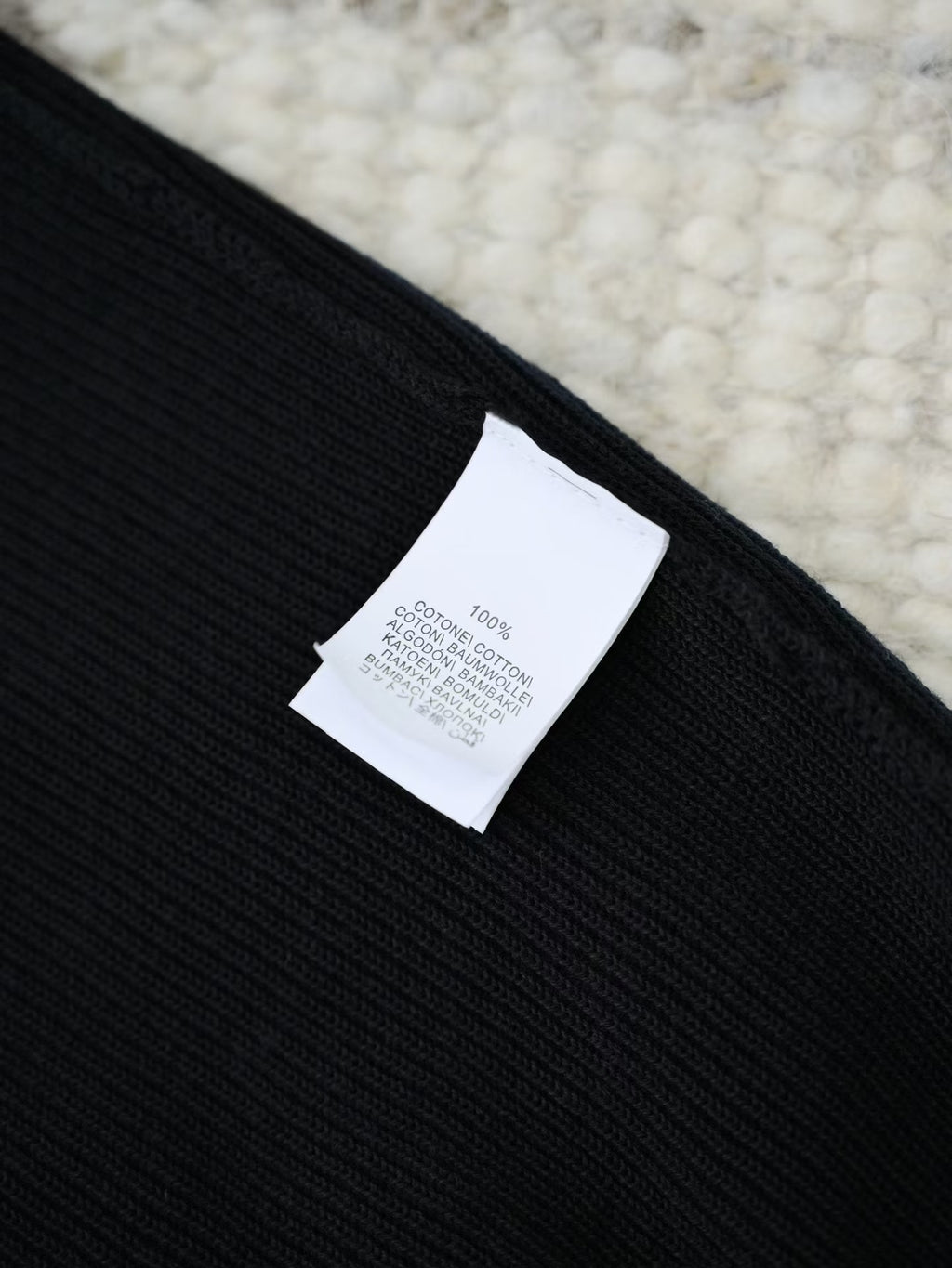 Brunello Cucinelli – Luxurioeses Strick Poloshirt in Schwarz aus feiner Baumwolle