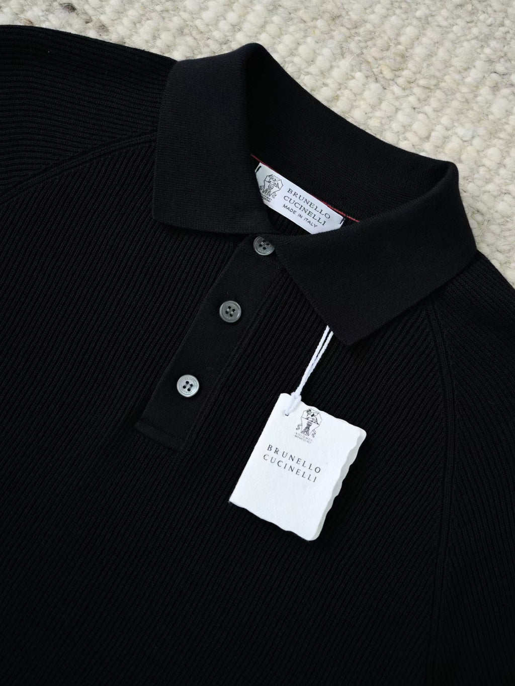 Brunello Cucinelli – Luxurioeses Strick Poloshirt in Schwarz aus feiner Baumwolle