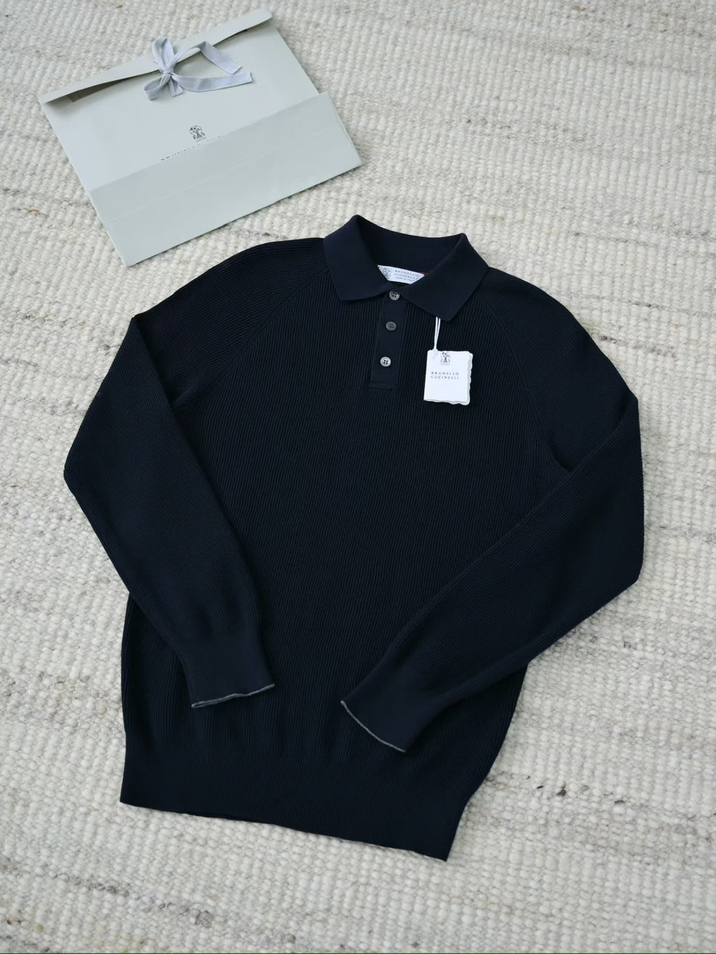 Brunello Cucinelli – Elegantes Strick Poloshirt in Schwarz aus feiner Baumwolle