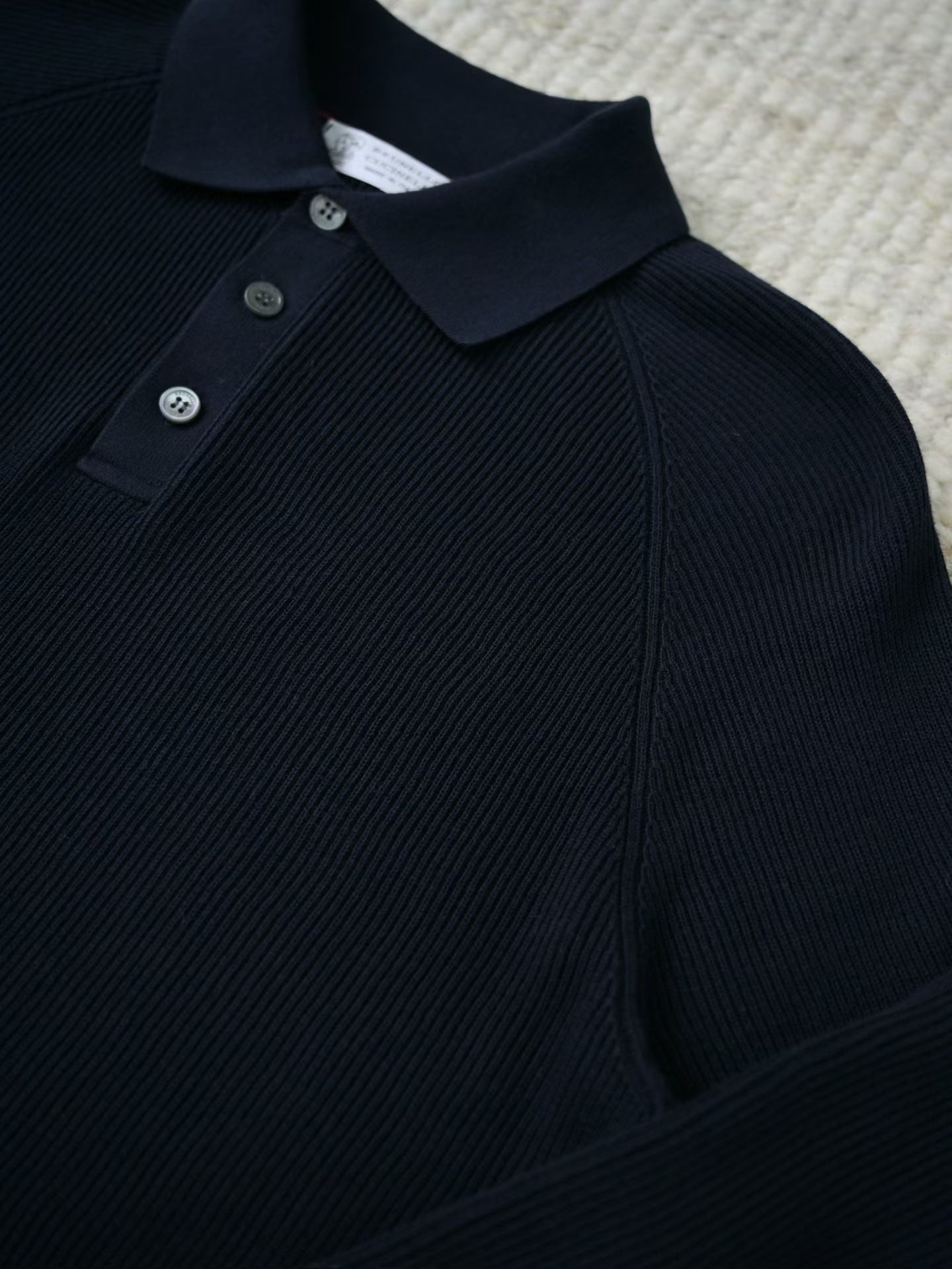 Brunello Cucinelli – Elegantes Strick Poloshirt in Schwarz aus feiner Baumwolle