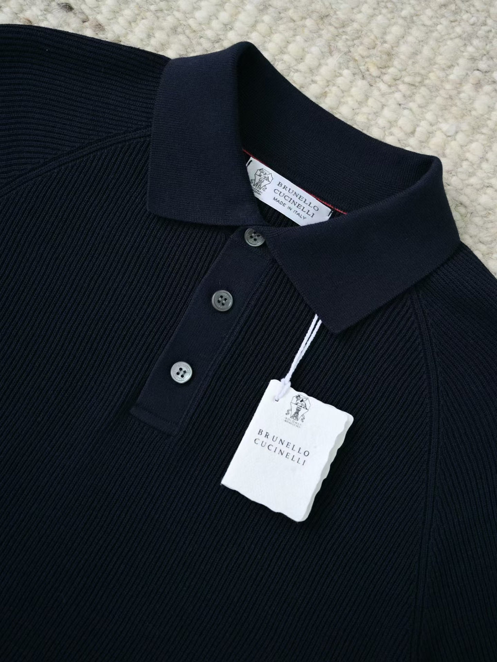 Brunello Cucinelli – Elegantes Strick Poloshirt in Schwarz aus feiner Baumwolle