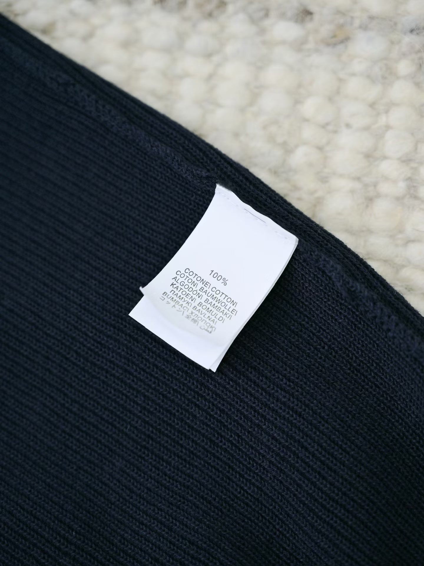 Brunello Cucinelli – Elegantes Strick Poloshirt in Schwarz aus feiner Baumwolle