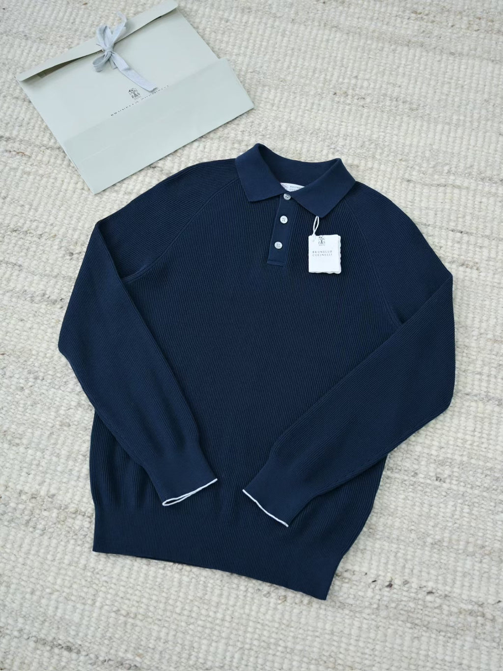 Brunello Cucinelli – Luxurioeses Strick Poloshirt in Dunkelblau aus feiner Baumwolle