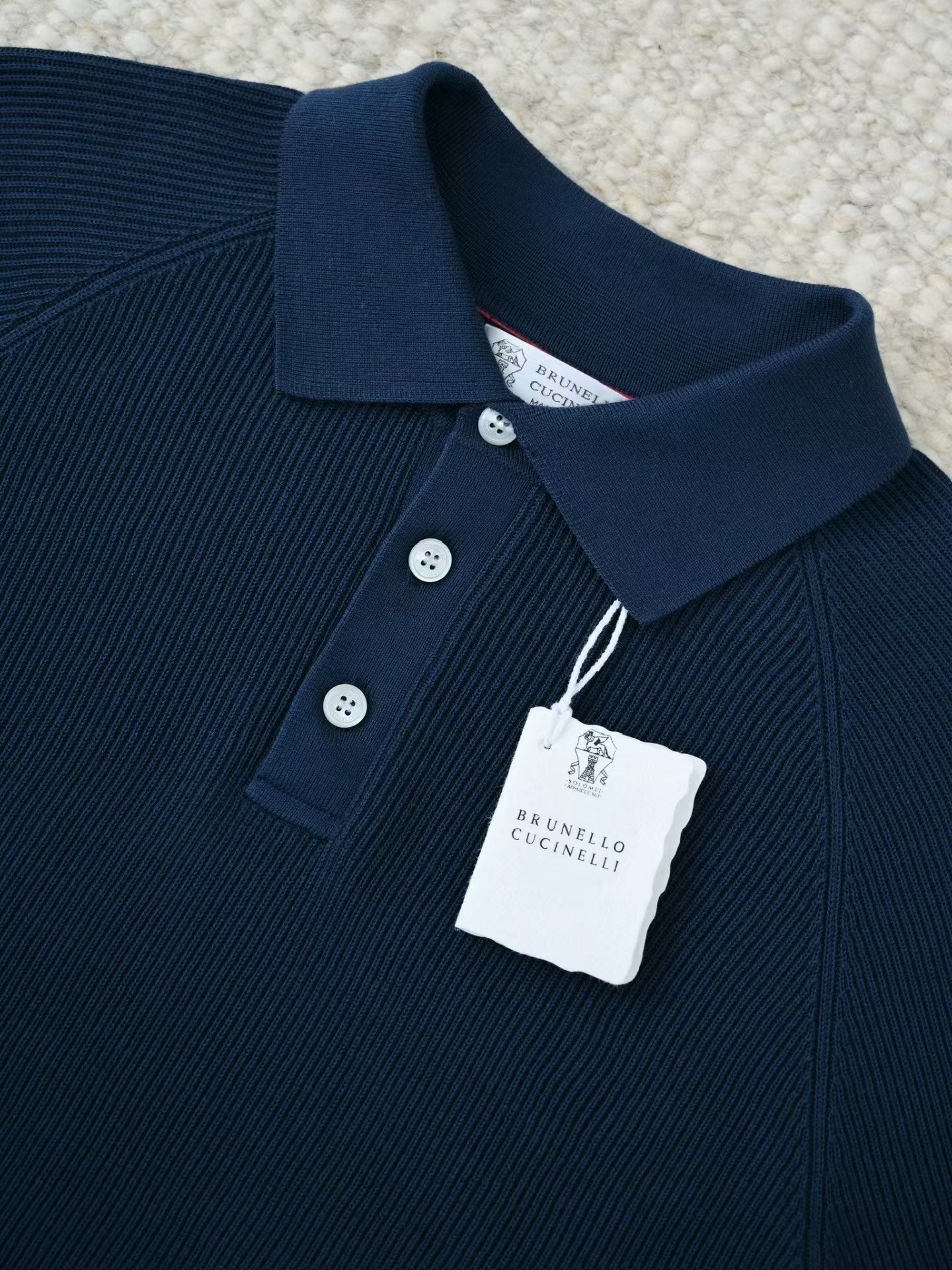Brunello Cucinelli – Luxurioeses Strick Poloshirt in Dunkelblau aus feiner Baumwolle