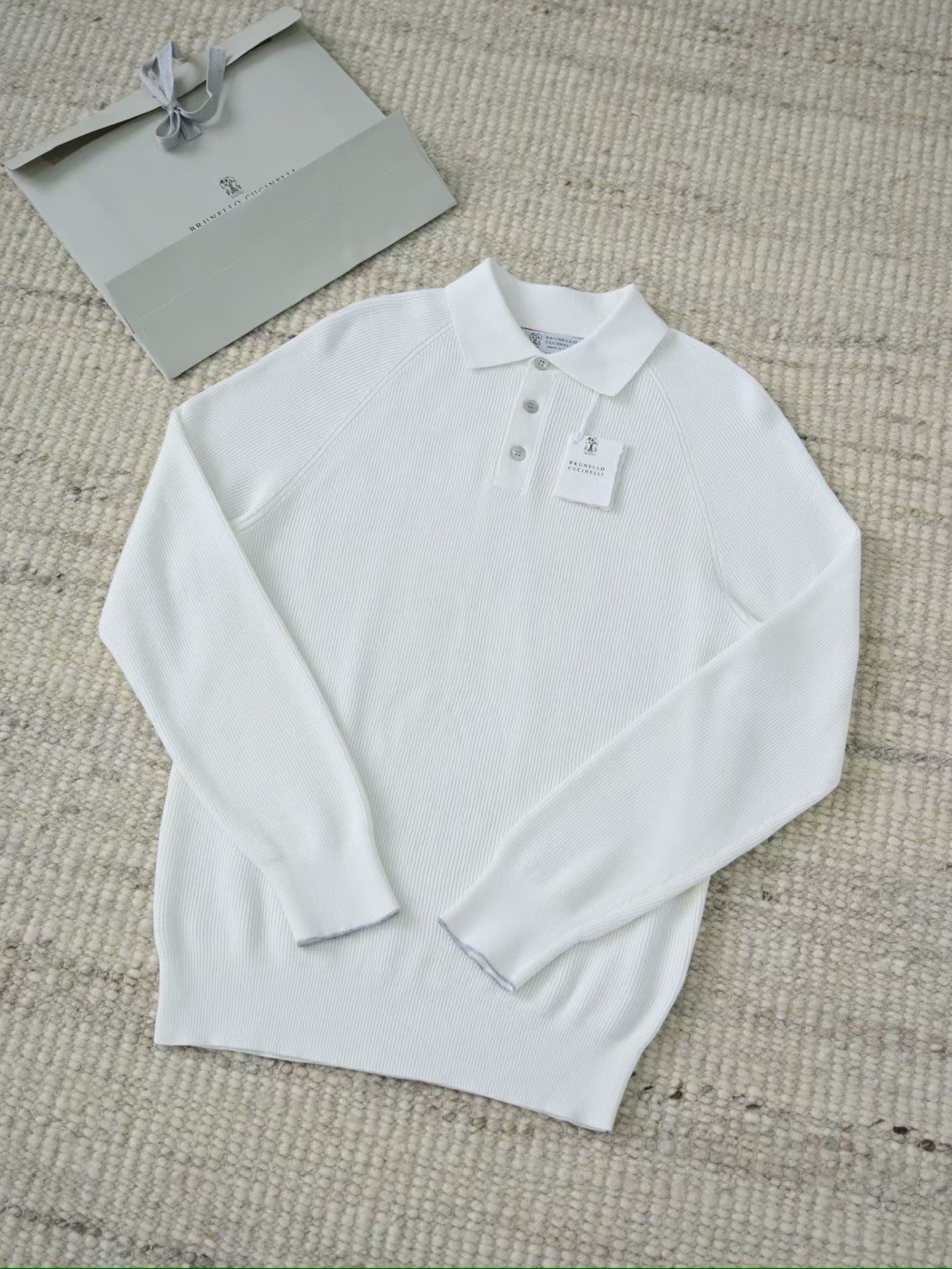 Brunello Cucinelli – Luxurioeses Strick Poloshirt in Weiss aus feiner Baumwolle