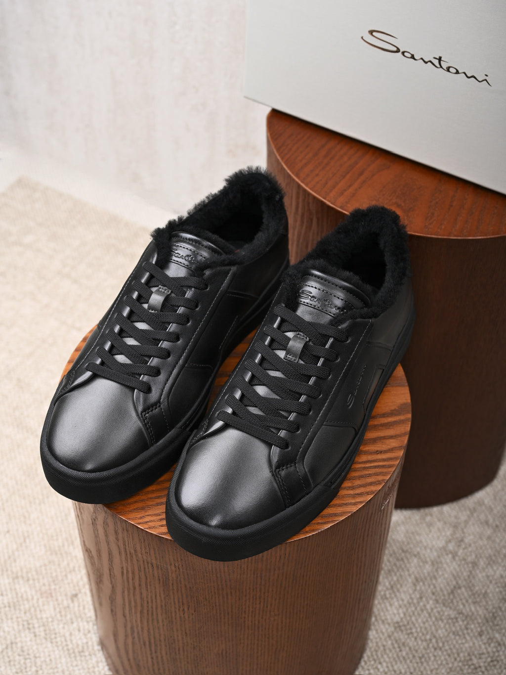 Santoni Leder-Sneaker mit Lammfellfutter in Schwarz