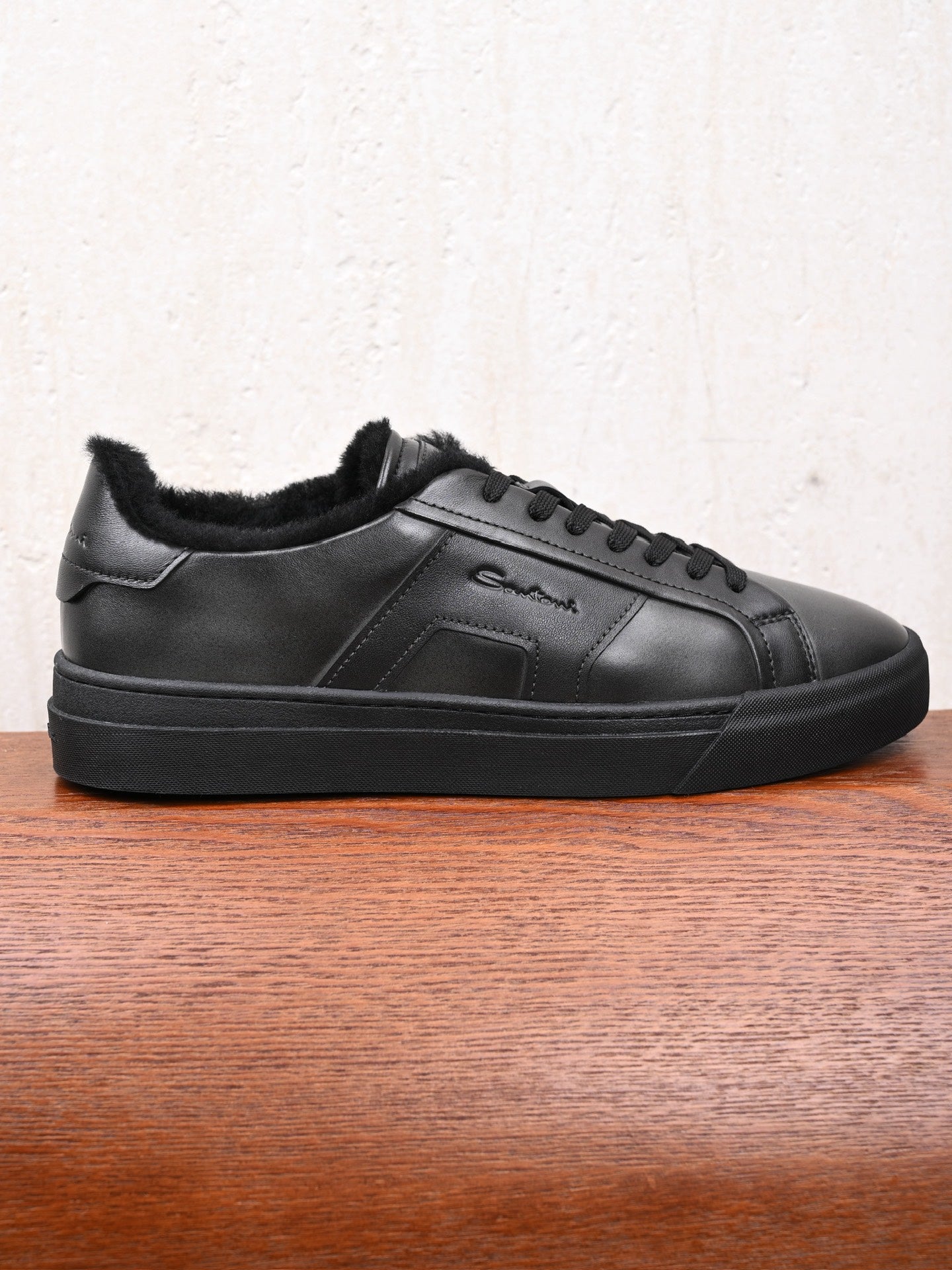 Santoni Leder-Sneaker mit Lammfellfutter in Schwarz